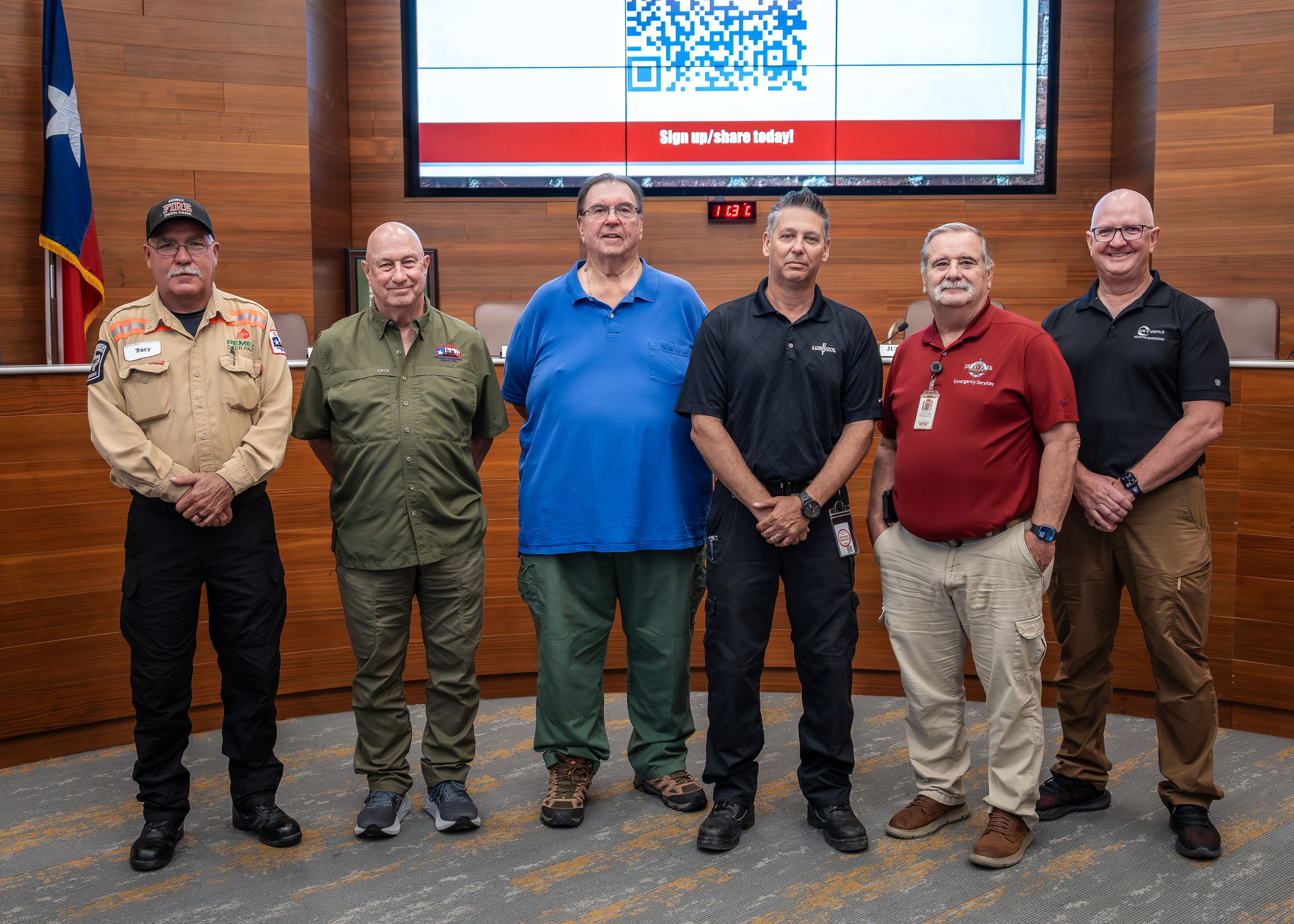 Several men standing in a line